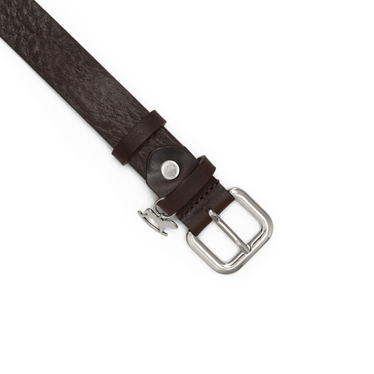 Leather belt with a silver buckle and signature charm