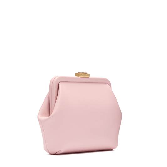 Leather bag with signature clasp and removable strap