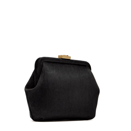 Suede bag with signature clasp and removable strap