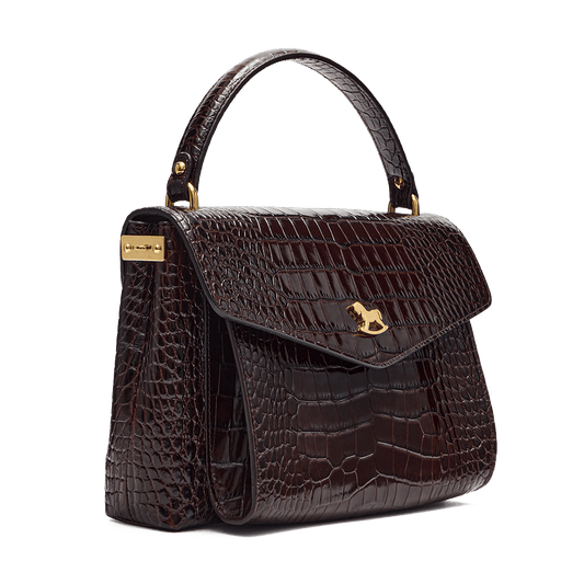 Leather satchel with a signature clasp