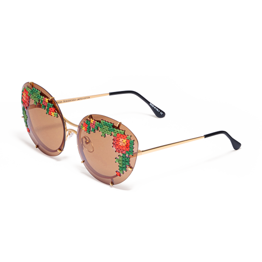 Sunglasses with hand-embroidered lenses