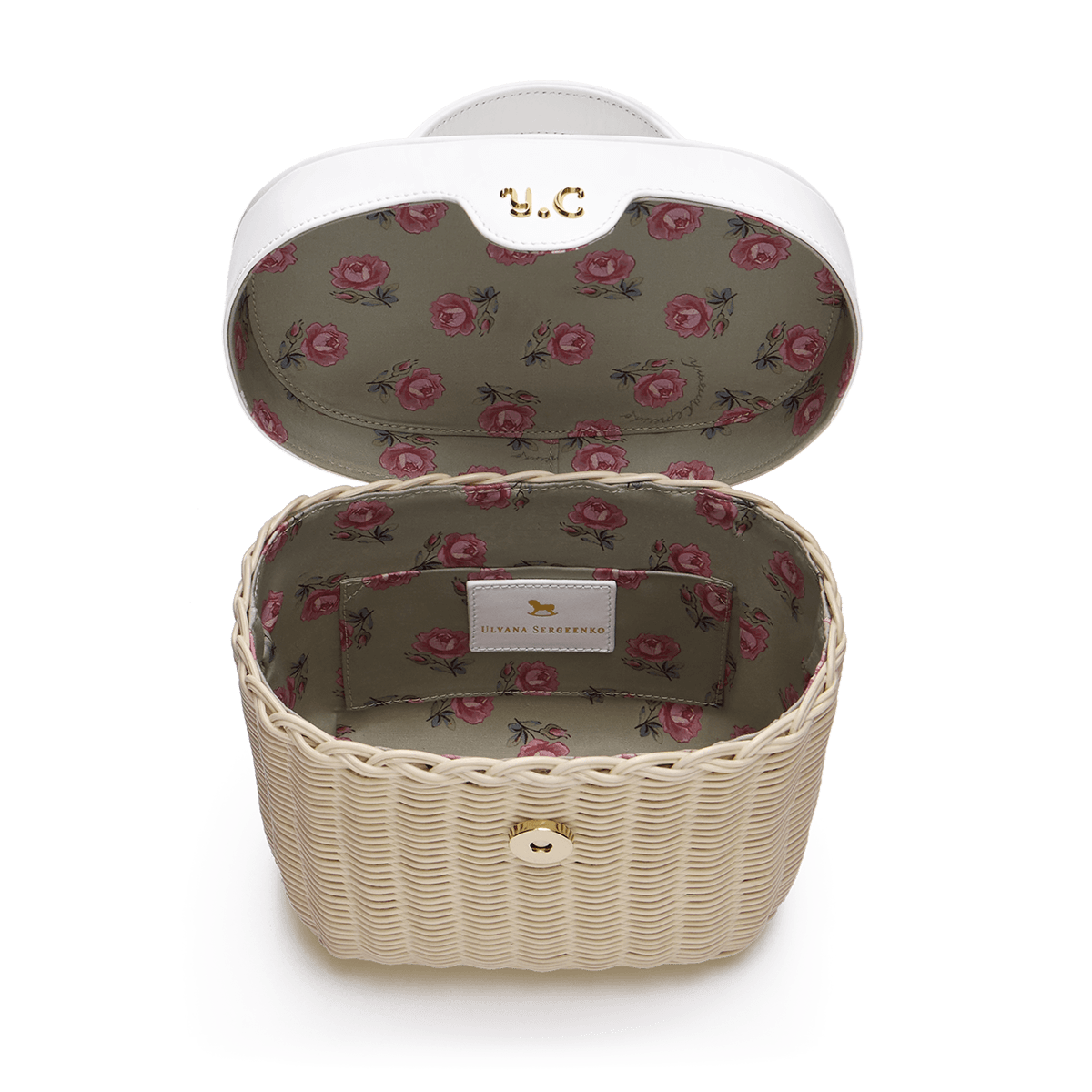 Woven basket with leather cover and floral lining
