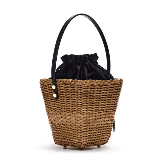 Woven basket with a charm