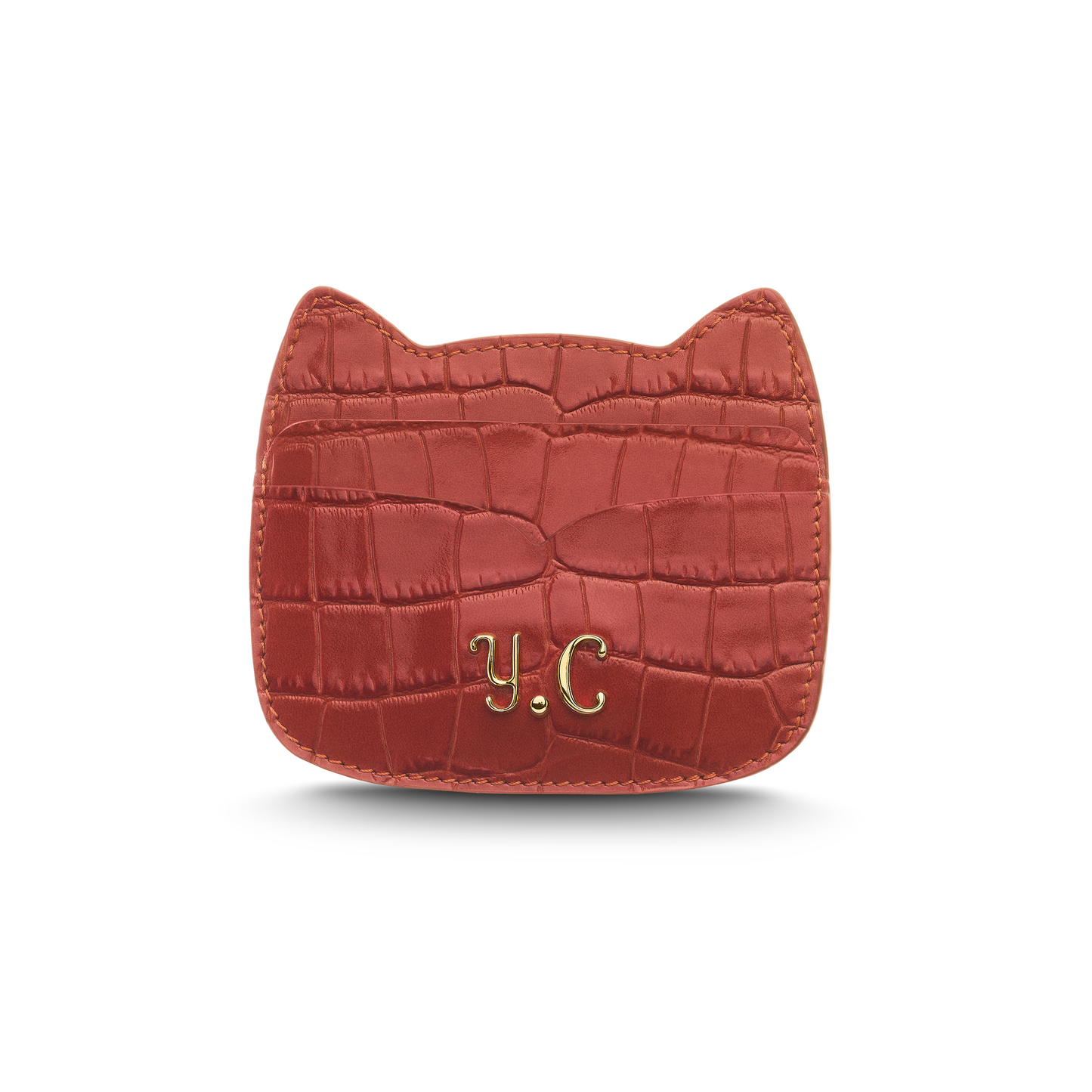 Cat-shaped leather cardholder with signature “U.S.” initials