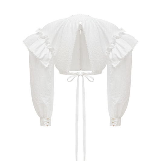 Cotton blouse with ruffled shoulders and an open back