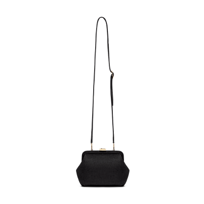 Suede bag with signature clasp and removable strap