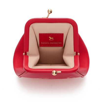 Leather mini bag with a signature print