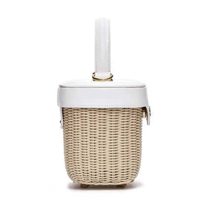 Woven basket with leather cover and floral lining