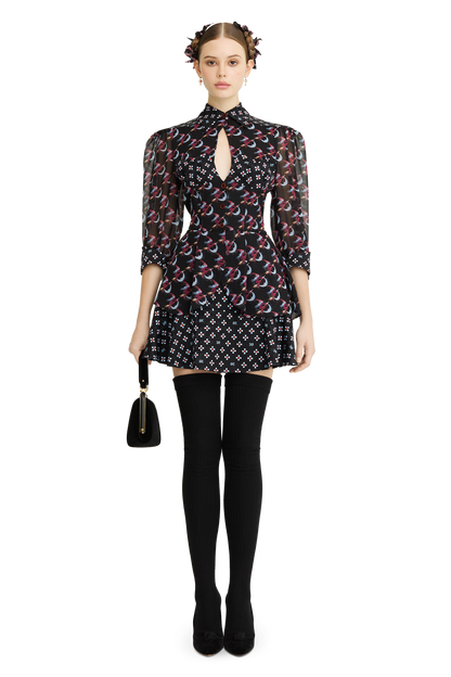 Mini skirt made of silk with a signature print