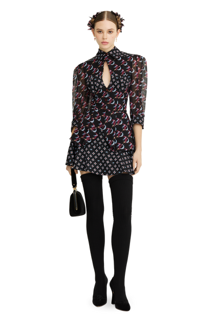 Silk peplum blouse with a signature print