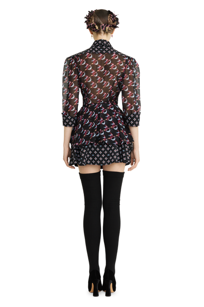 Mini skirt made of silk with a signature print