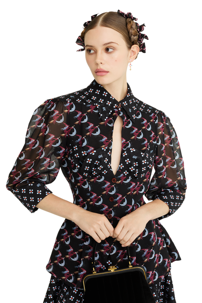 Silk peplum blouse with a signature print