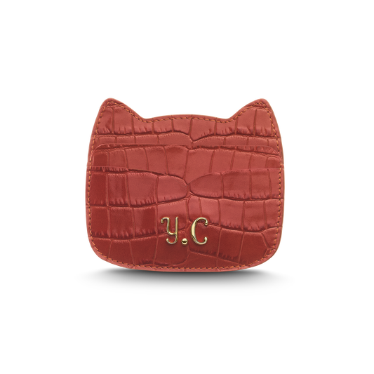 Cat-shaped leather cardholder with signature “U.S.” initials