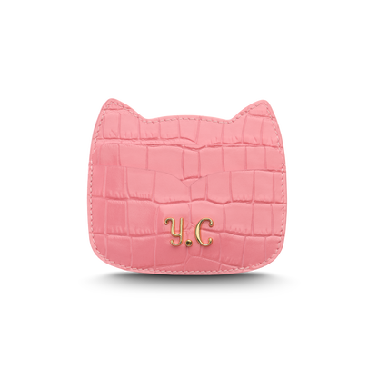Cat-shaped leather cardholder with signature “U.S.” initials