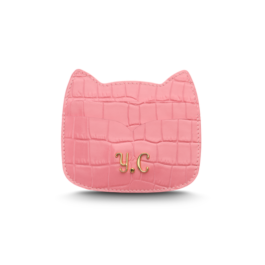 Cat-shaped leather cardholder with signature “U.S.” initials